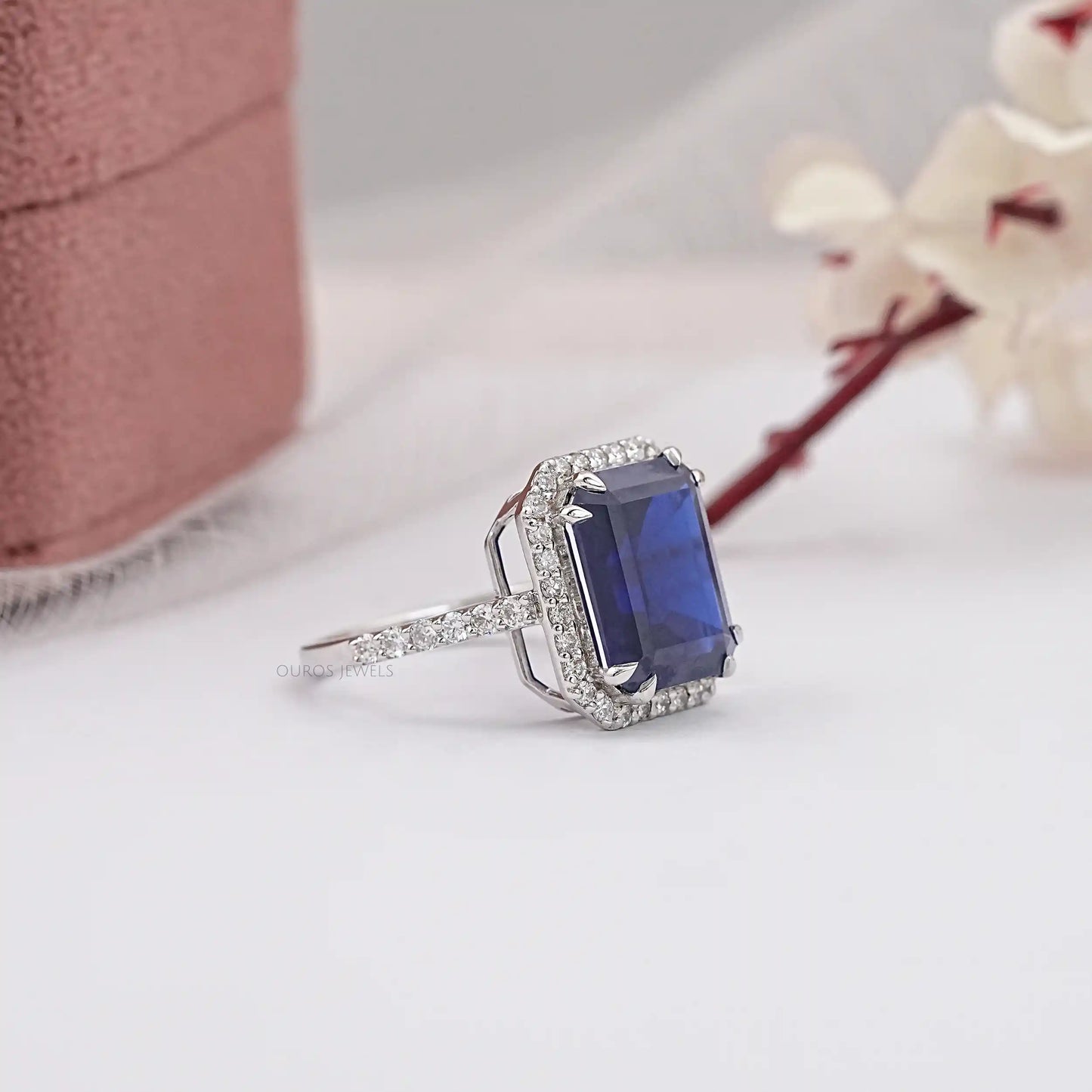 Blue Emerald Cut Halo With Accent Diamond Ring
