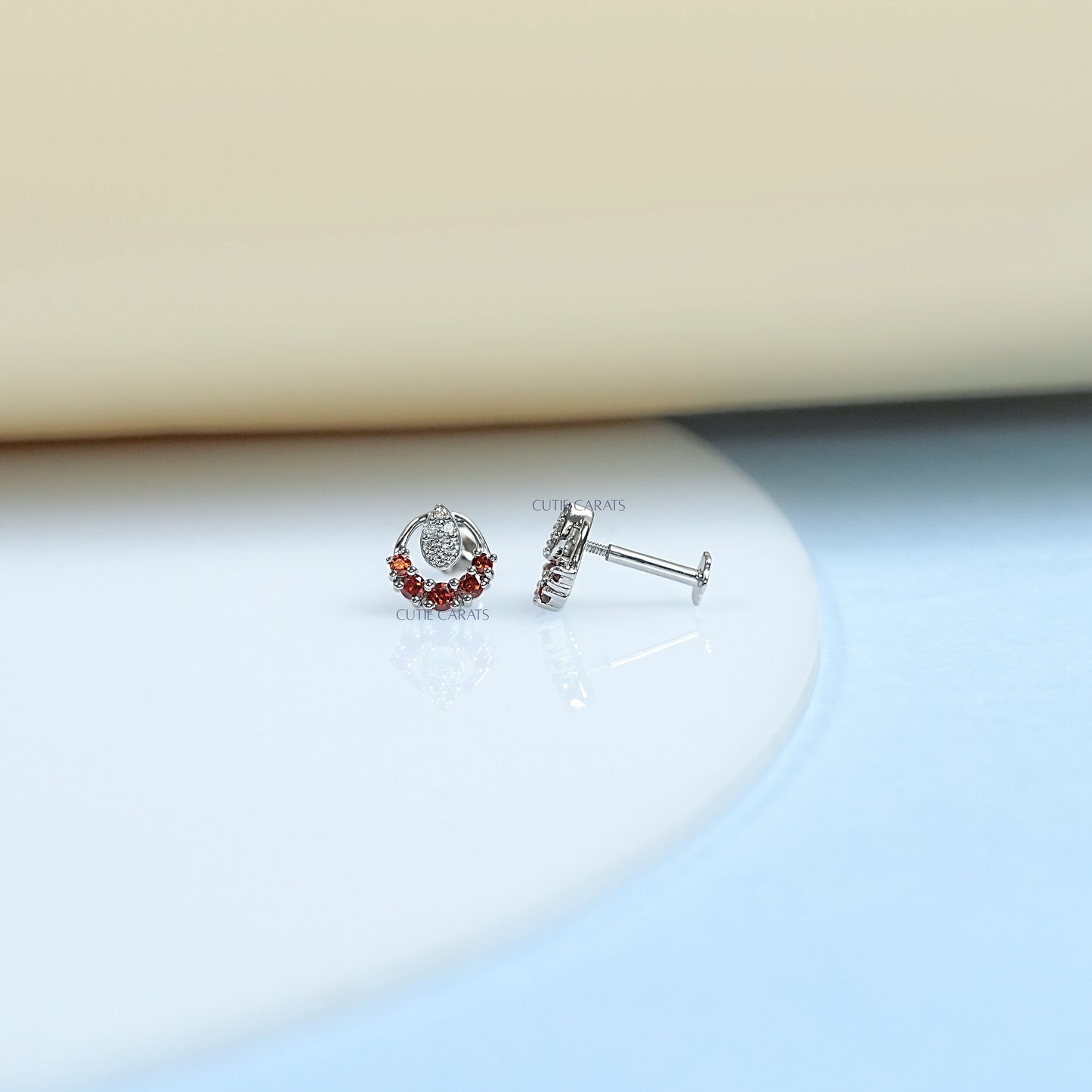 Round Diamond And Ruby Stud Earrings