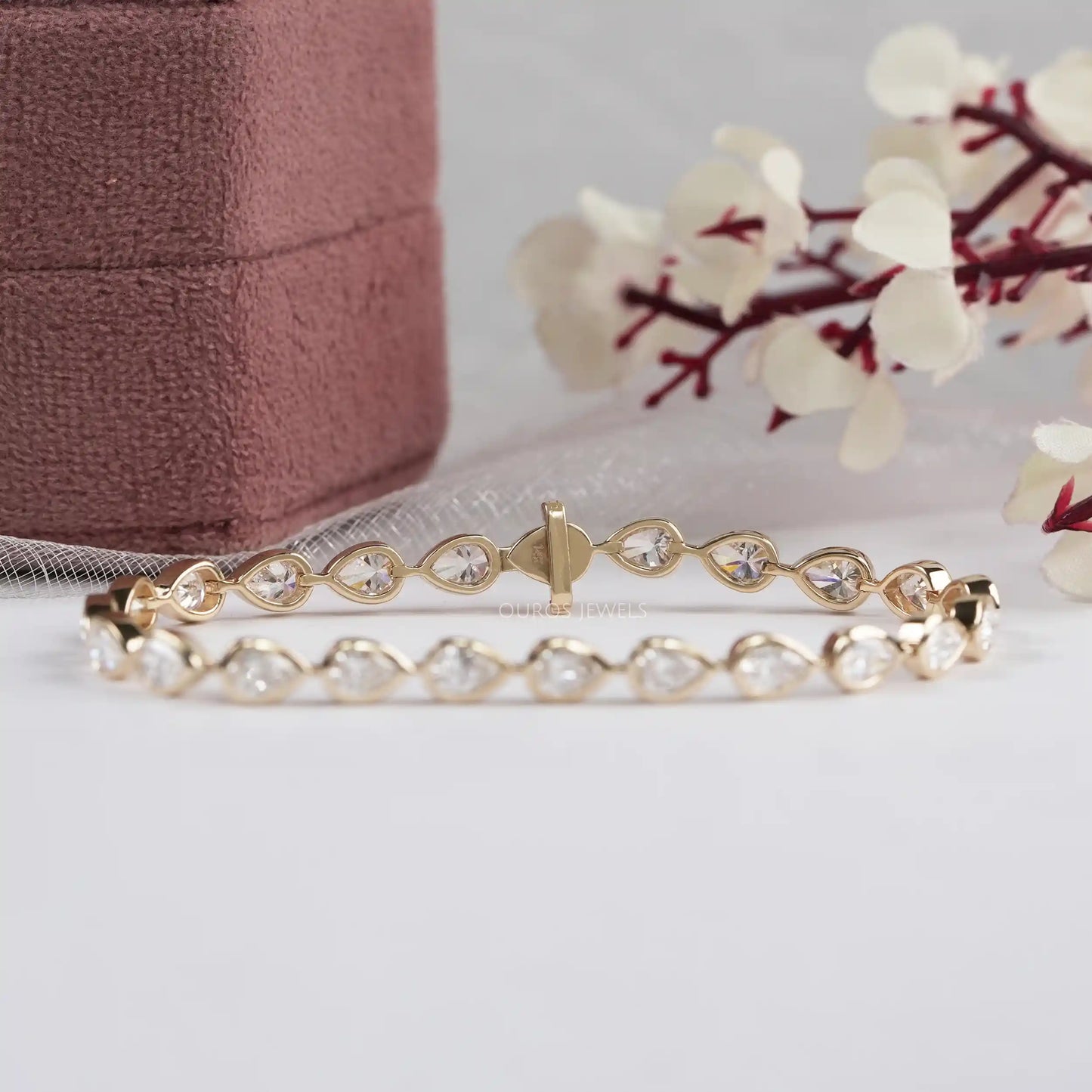 Bezel Set Pear Cut East West Lab Diamond Tennis Bracelet