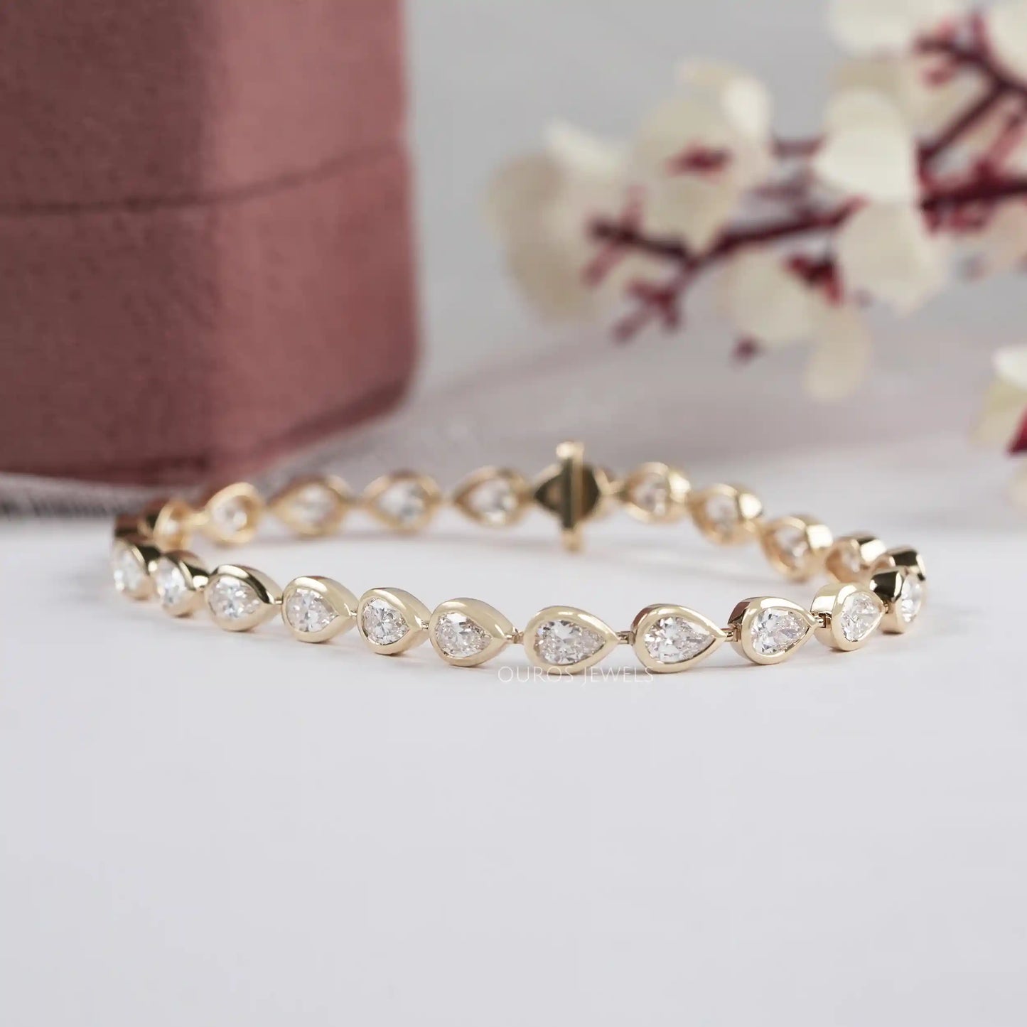 Bezel Set Pear Cut East West Lab Diamond Tennis Bracelet