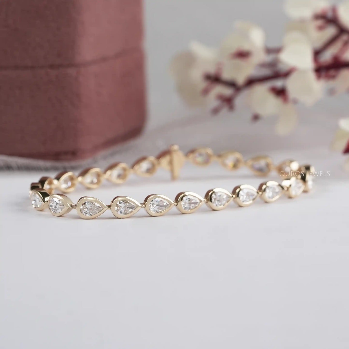Bezel Set Pear Cut East West Lab Diamond Tennis Bracelet