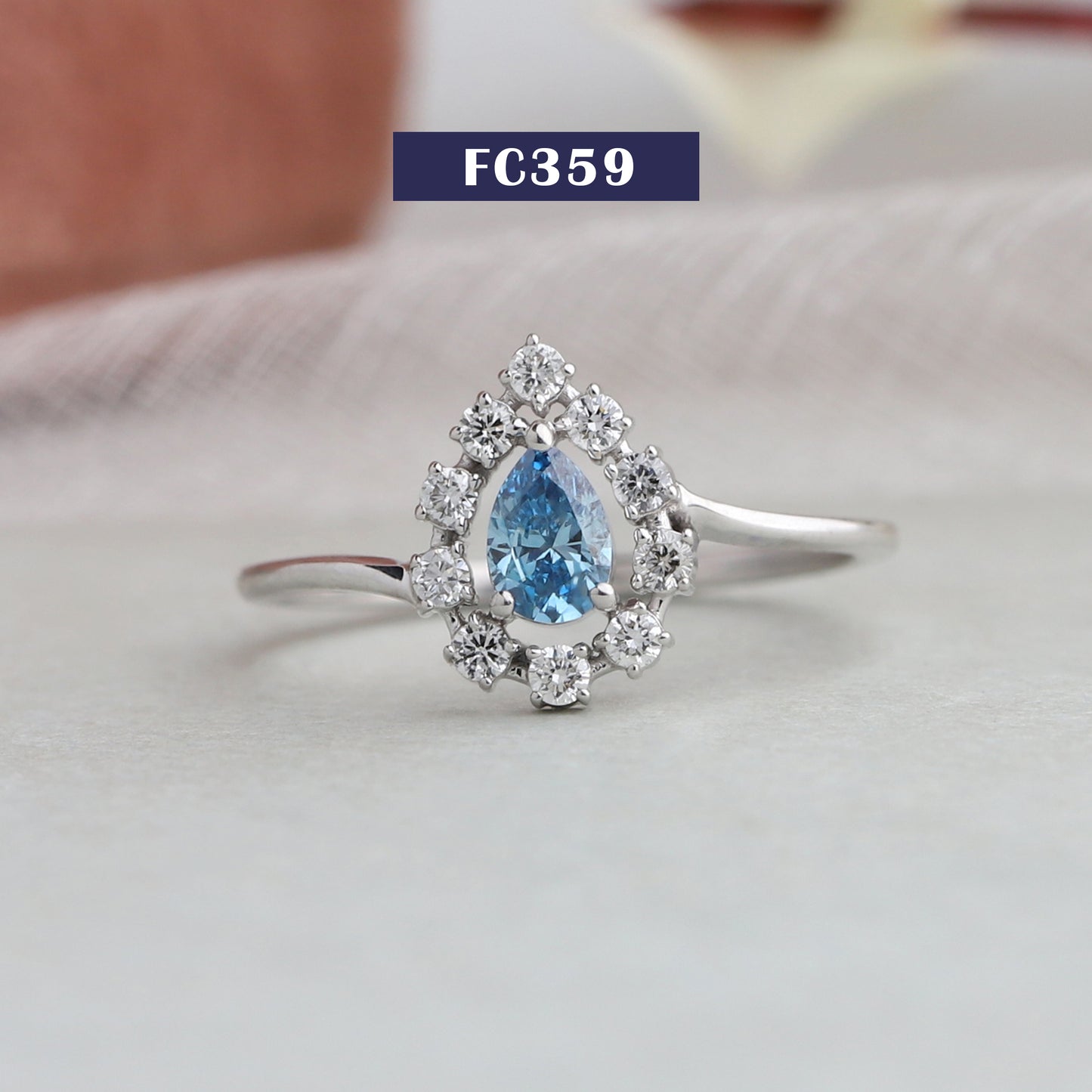 Blue Pear Cut Halo Lab Diamond Ring