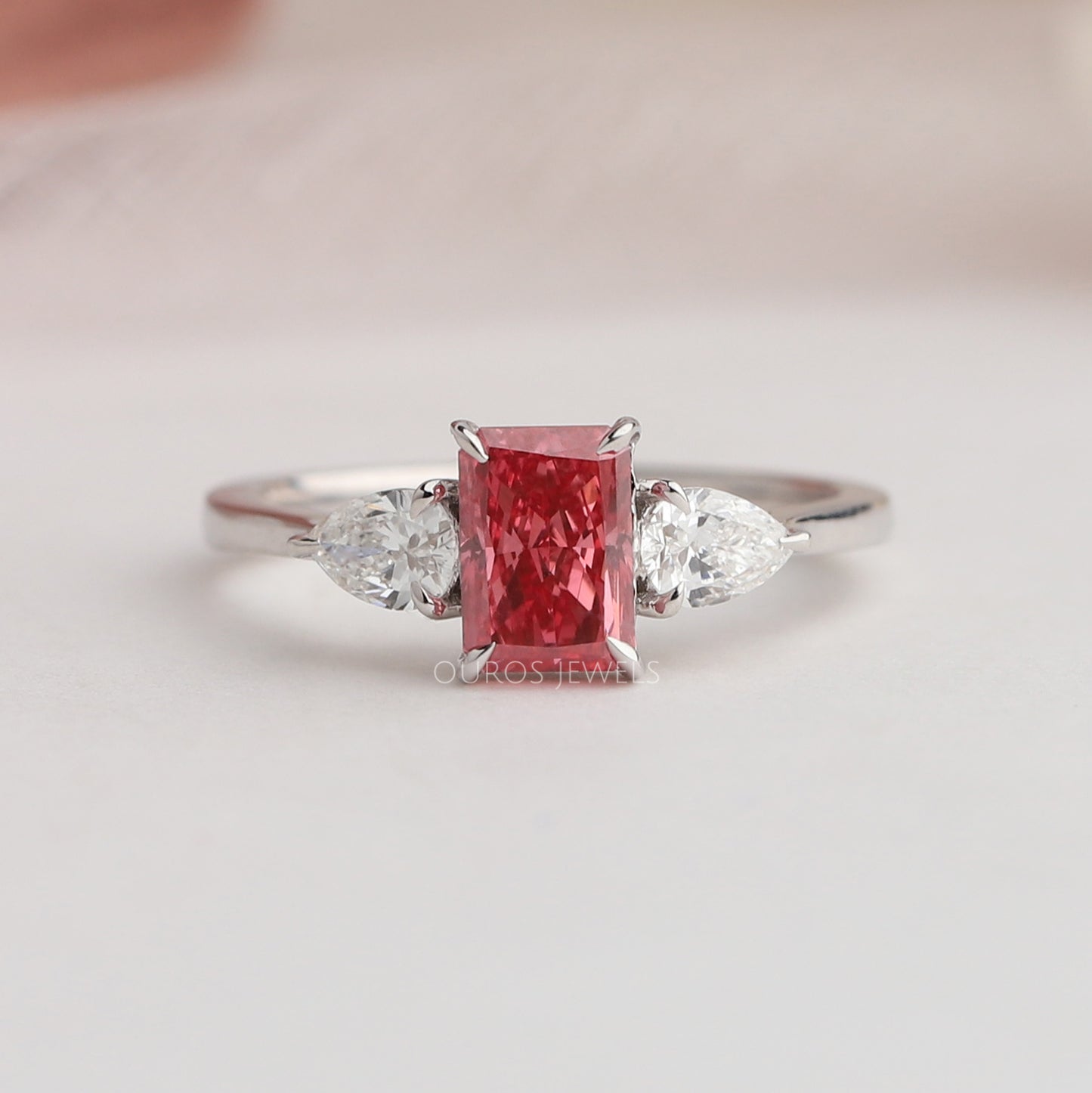 Radiant And Pear Cut Lab Diamond Three Stone Ring