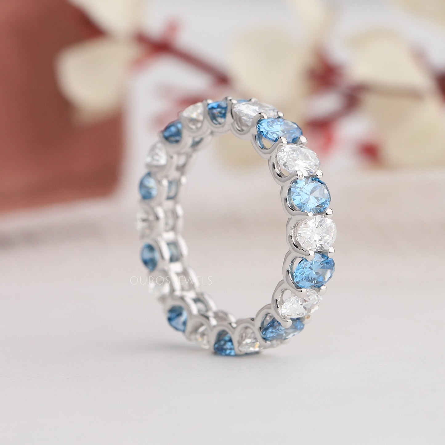 Blue Oval Cut Eternity Wedding Band