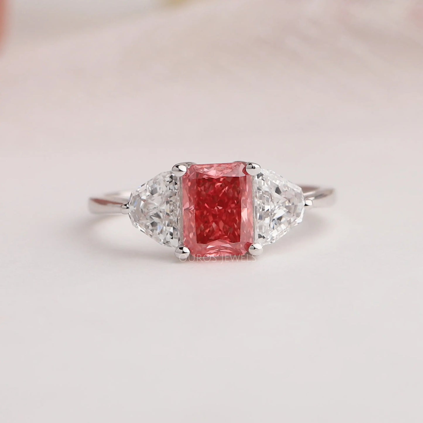 Pink Radiant And Half Moon Cut Three Stone Ring