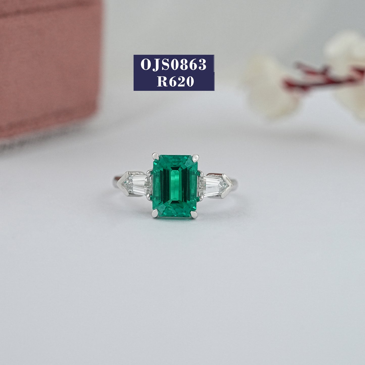 Green Emerald And Bullet Cut Three Stone Ring