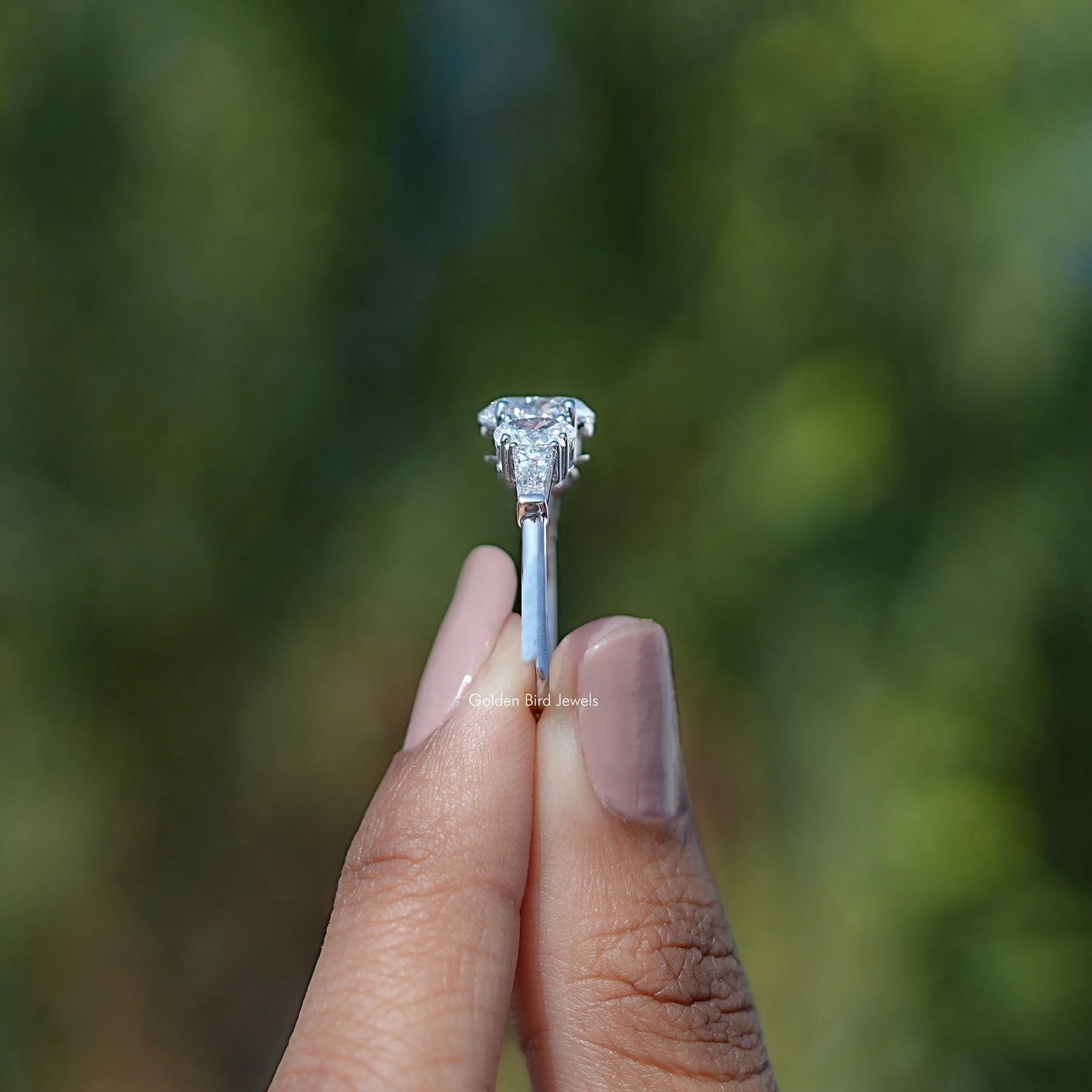 Oval And Tapered Baguette Diamond Five Stone Ring