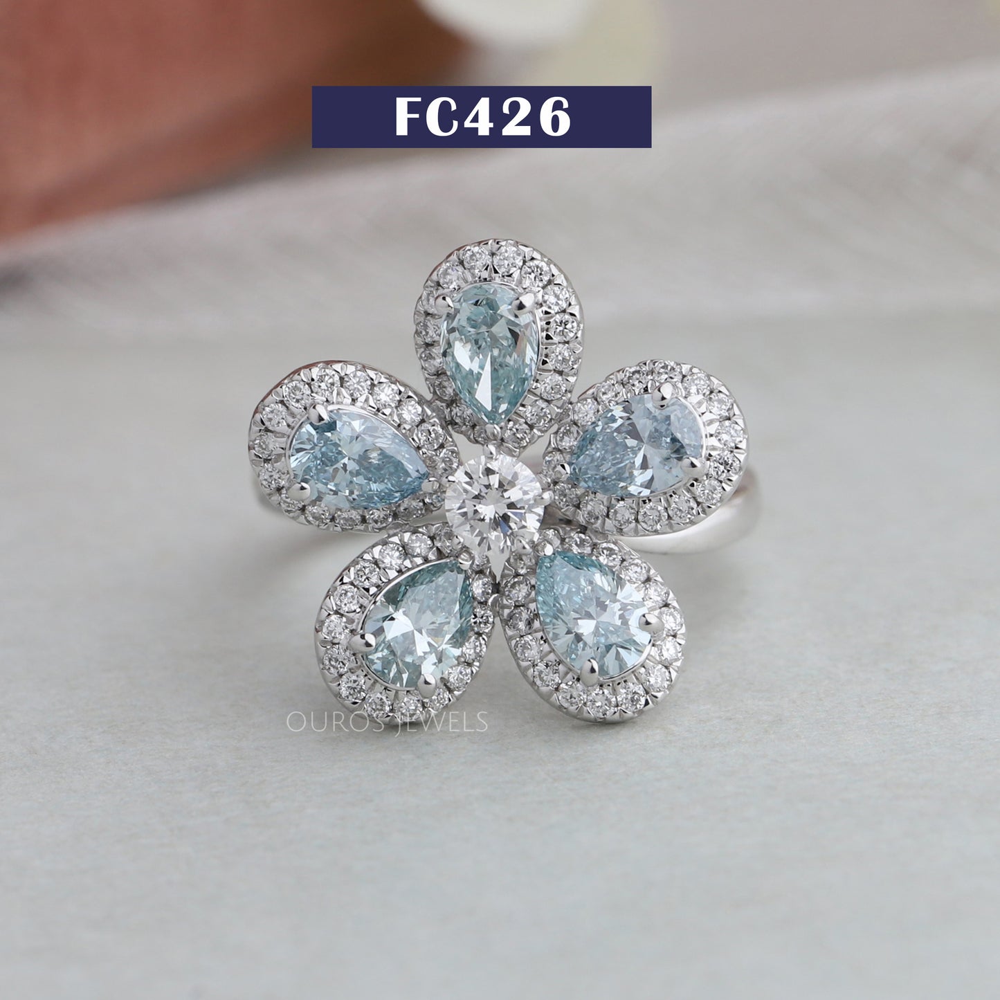 Light Blue Pear Halo Wedding Ring