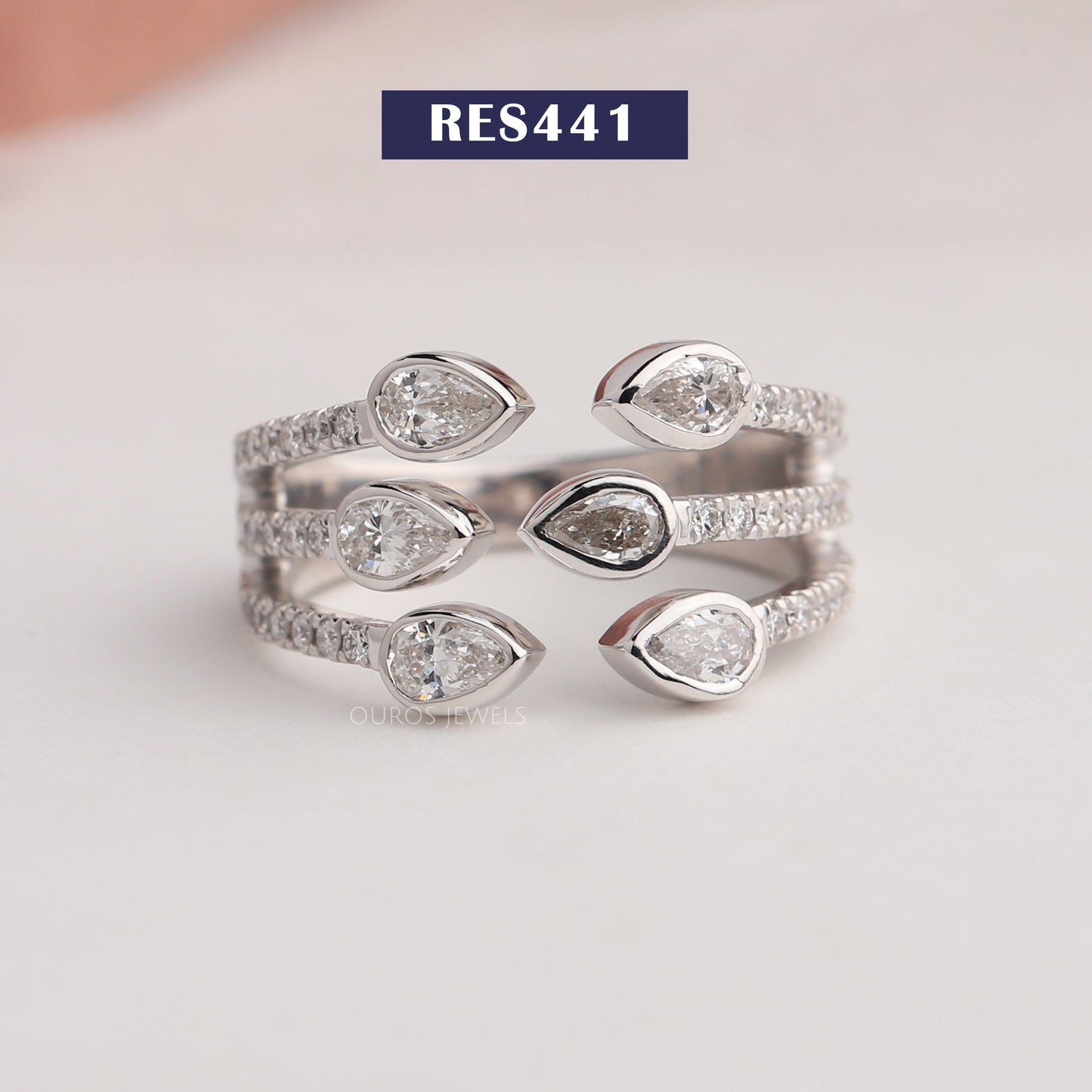 Pear Diamond Bezel Set Open Band