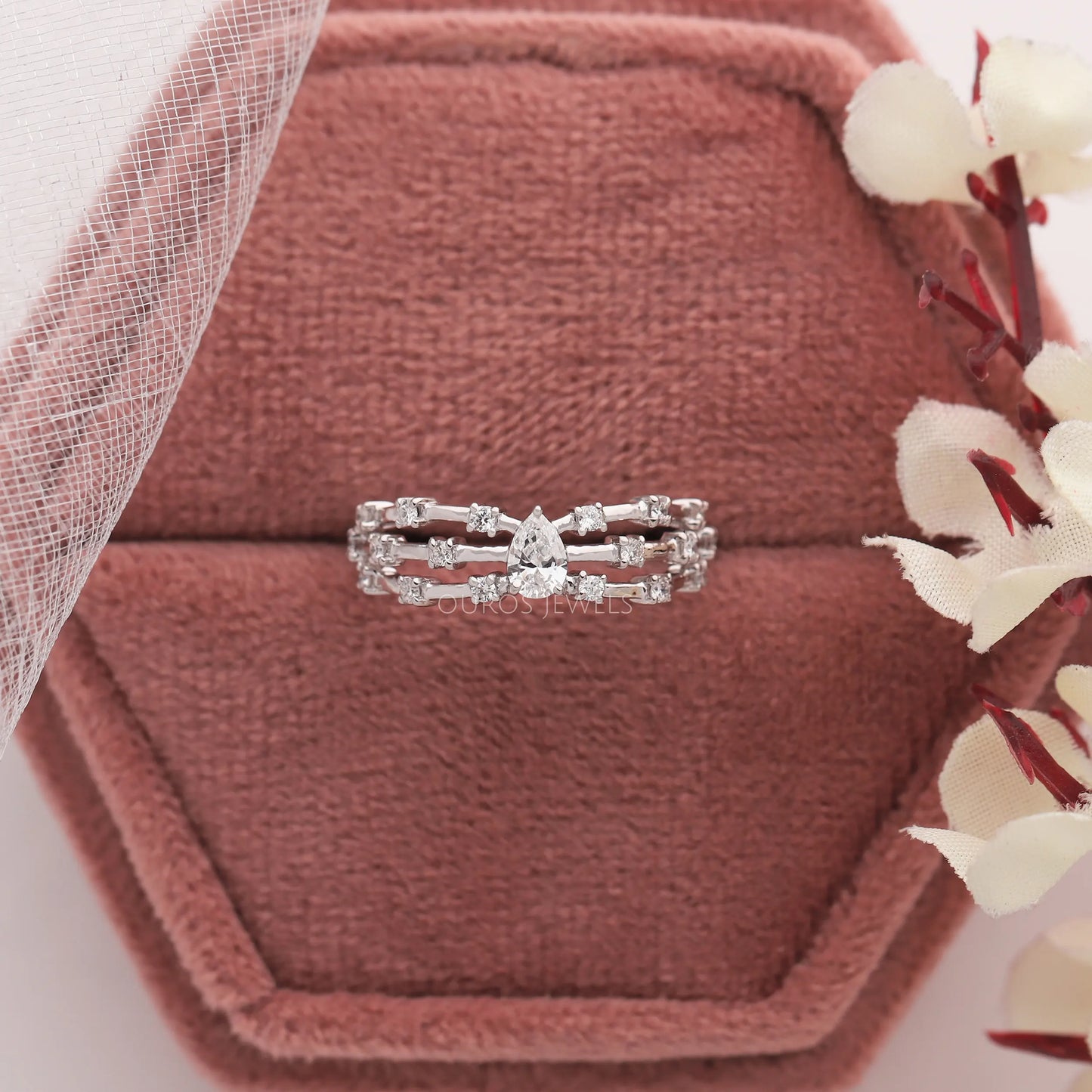 Pear Cut Diamond Triple Row Ring