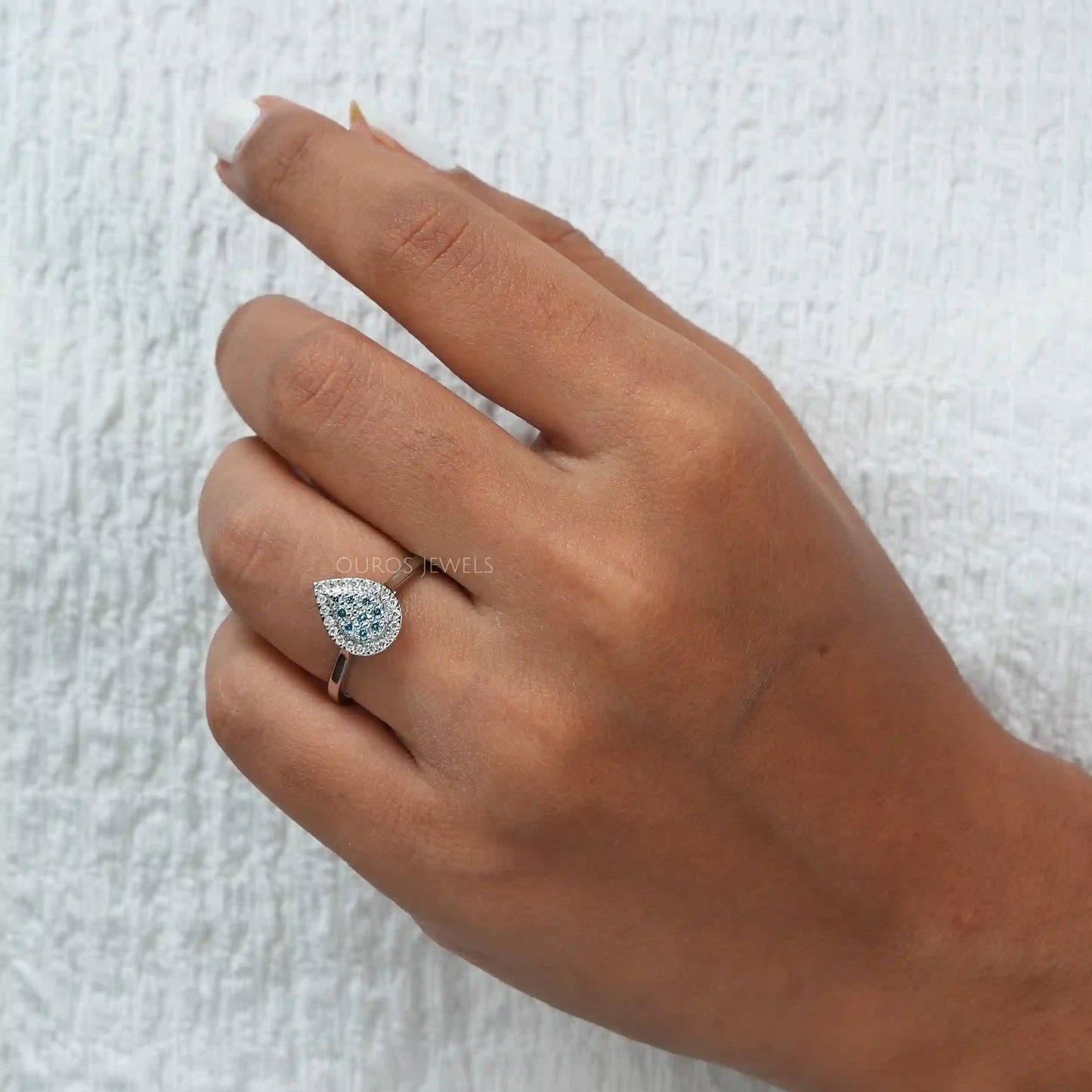 Blue Round Diamond Teardrop Ring