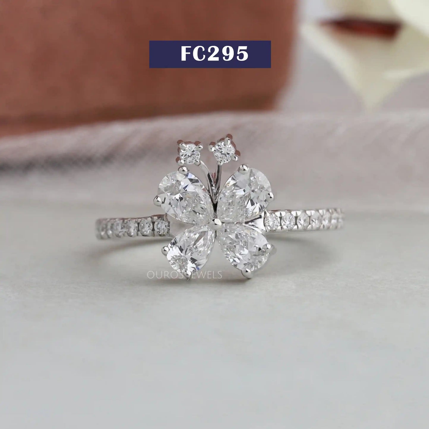 Pear Cut Accent Diamond Ring