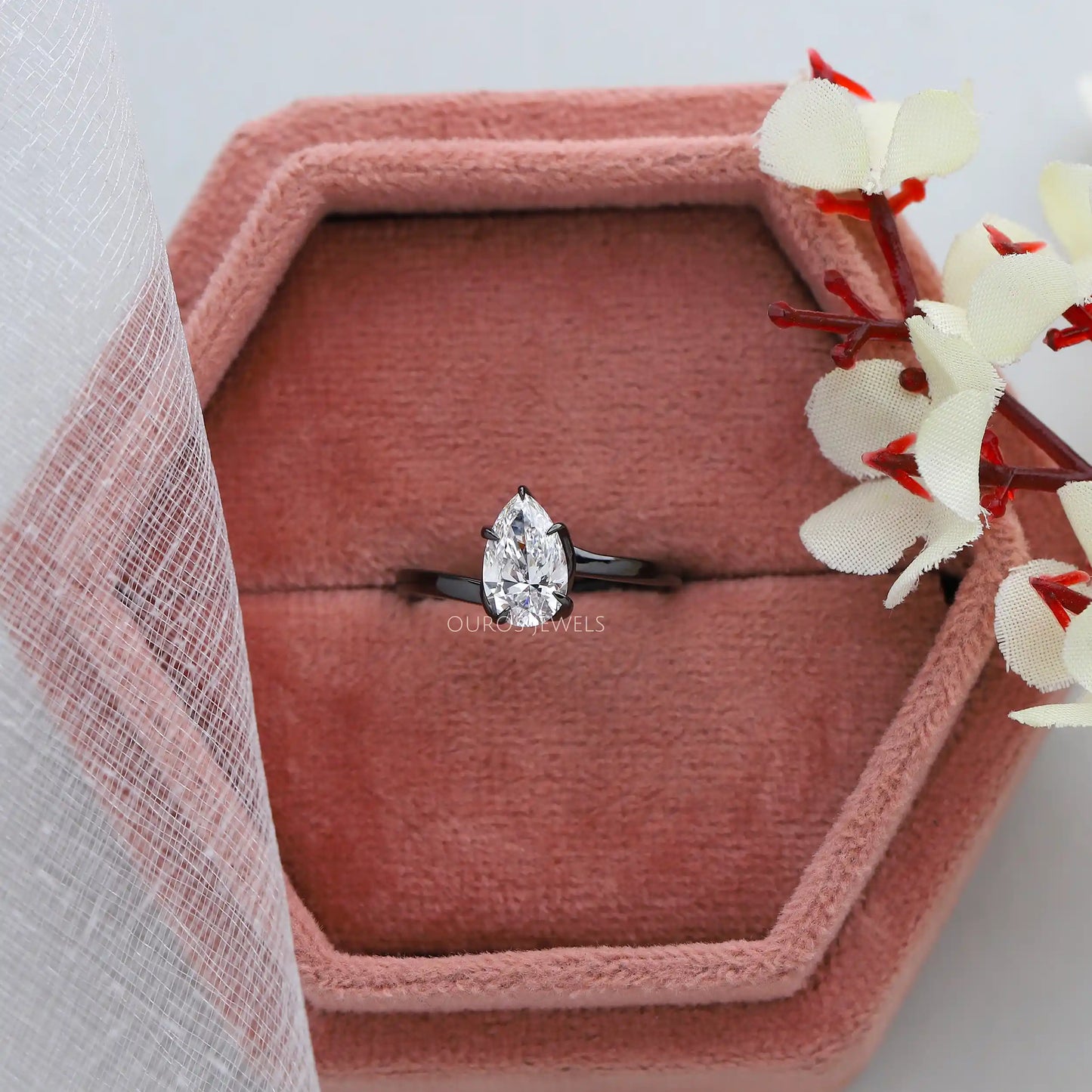 Pear Cut Solitaire Engagement Ring