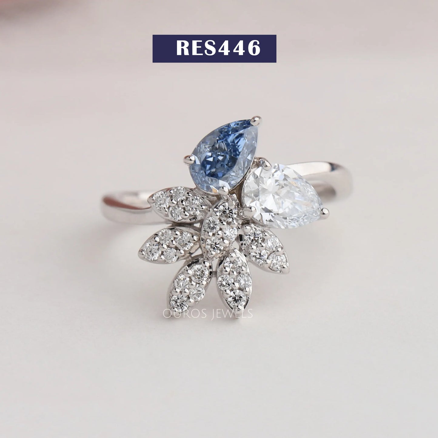 Blue Pear And Round Cluster Engagement Ring