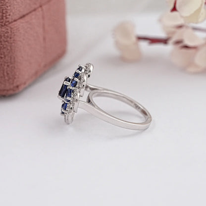 Oval Cut Blue Lab Gemstone Halo Diamond Ring