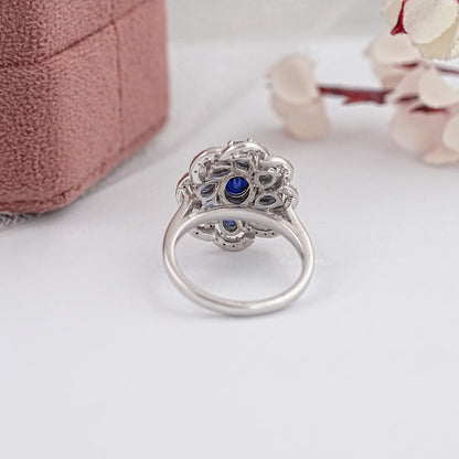 Oval Cut Blue Lab Gemstone Halo Diamond Ring