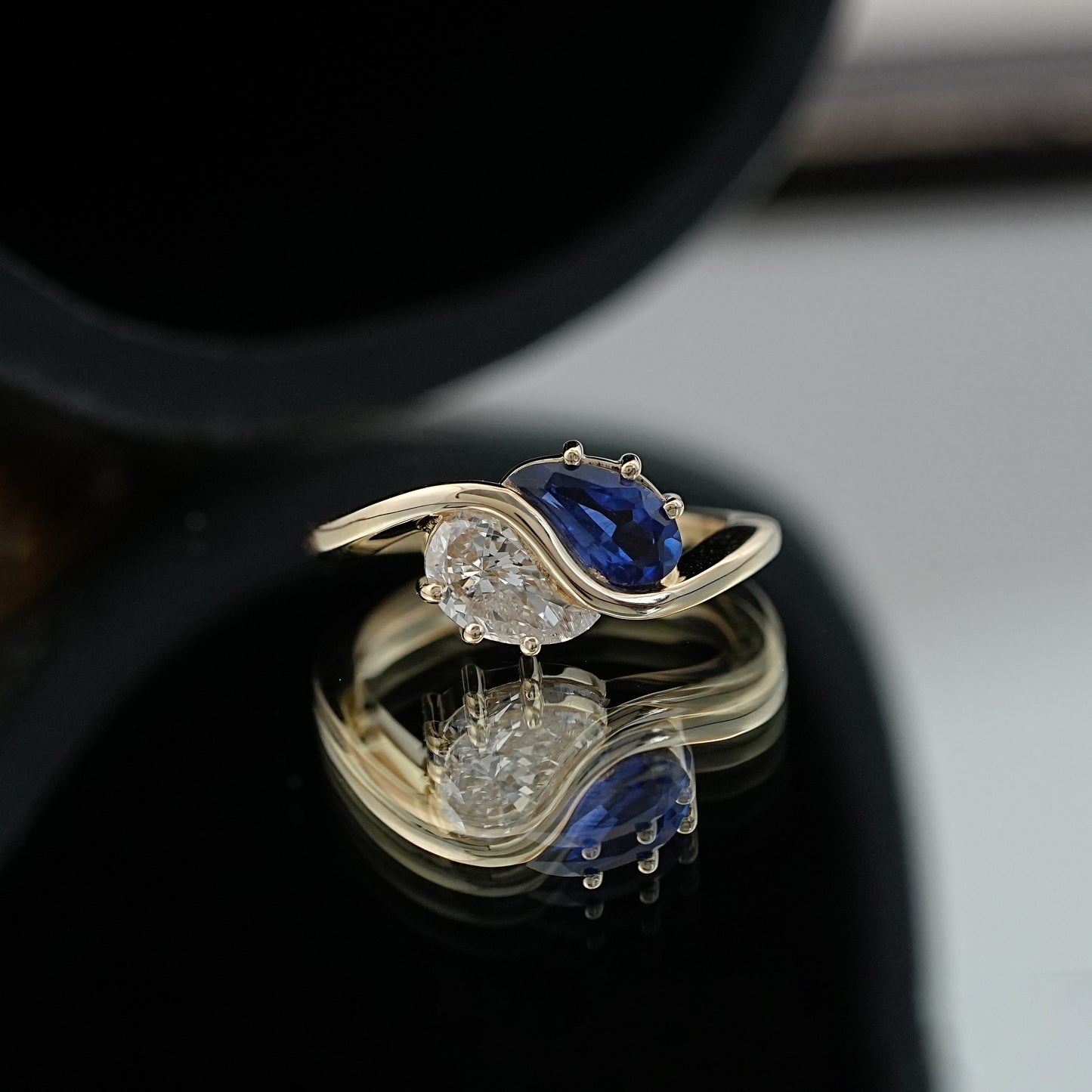 Sapphire Modified Pear Cut Two Stone Bypass Ring