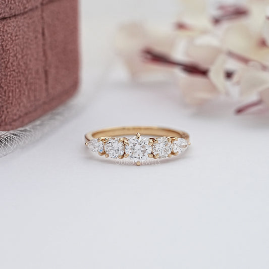 Round And Pear Diamond Engagement Ring