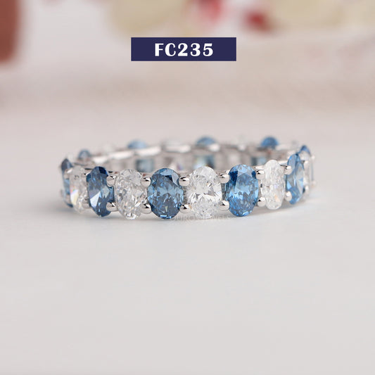 Blue Oval Cut Eternity Wedding Band