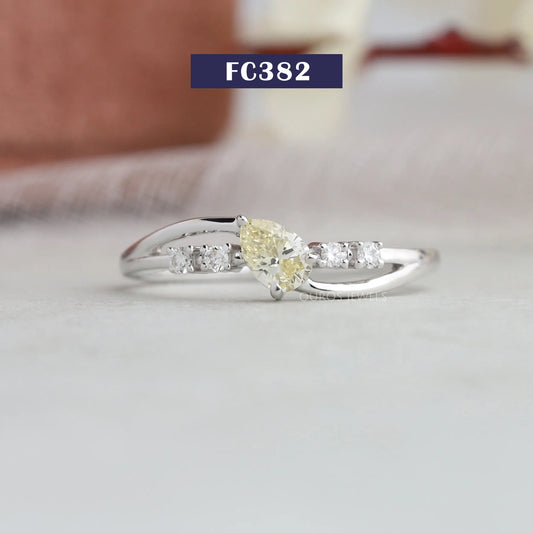 Yellow Pear Cut Curved Diamond Ring