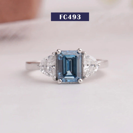 Blue Emerald Cut 3 Stone Ring